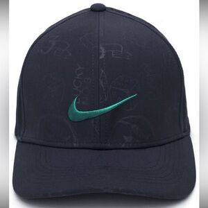 NWOT-Mens Nike Dark Blue AEROBILL classic 99 Cap with Teal Swoosh LOGO.